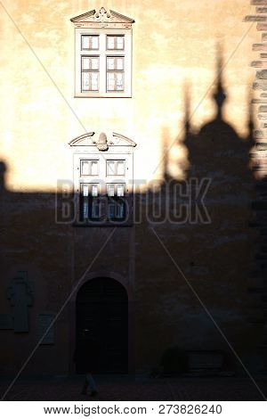 Aschaffenburg, Germany - November 17: A Visitor Of Castle Johannisburg Walks Through The Shadow Of T