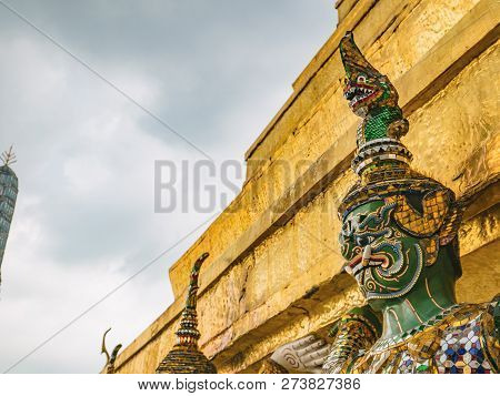 Close Up Green Giant Lift Golden Pagoda In Wat Phrakaew Temple Bangkok Thailand.wat Phrakeaw Temple 