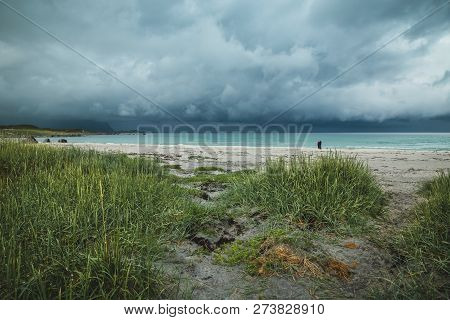 Beautiful Beach Skagsanden In Flakstad, Lofoten Islands In Norway In Summer Time. Stormy Clouds.