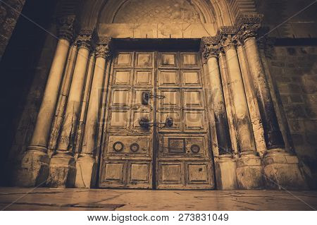 Old Wooden Door Of Entrance To The Church Of The Holy Sepulchre, Also Called The Church Of The Resur