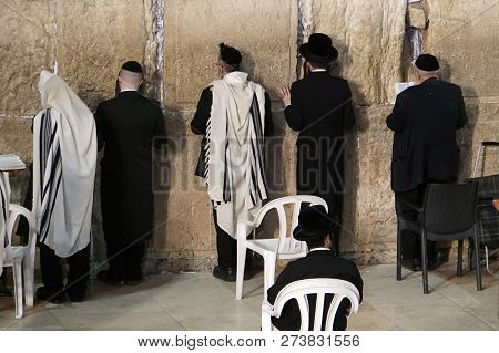 Othodox Jewish Men Wailing At Western Wall, Wailing Wall, An Ancient Limestone Wall In The Old City 