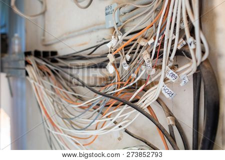 A Lot Of Internet, Ethernet Utp Cables And Electrical Cables With Labels Without Cable Trays Are Tem