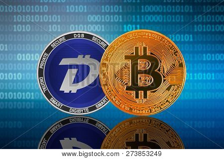 Bitcoin (btc) And Digibyte (dgb) Coin On The Binary Code Background; Bitcoin Vs Digibyte