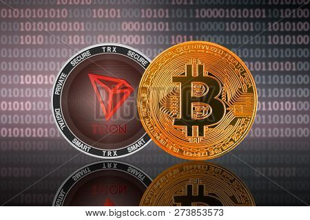 Bitcoin (btc) And Tron (trx) Coin On The Binary Code Background; Bitcoin Vs Tron