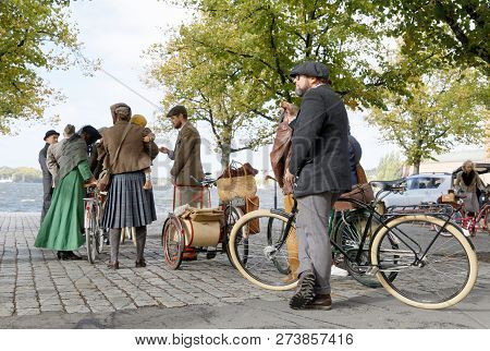 Stockholm - Sept 22, 2018: People Wearing Old Fashioned Tweed Clothes From The 1950s Leading Their R