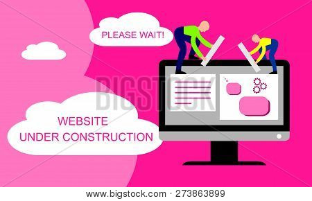 Website Under Construction. Two Of Young Professionals Working On A Web Page. Web Development.