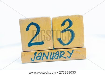 January 23th. Day 23 Of Month, Calendar On Wooden Background. Winter Time, Year Concept.