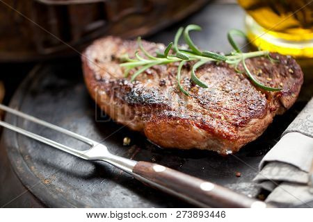 Fresh Juicy Medium Rare Beef Grillsteak. Barbecue Meat Close Up.