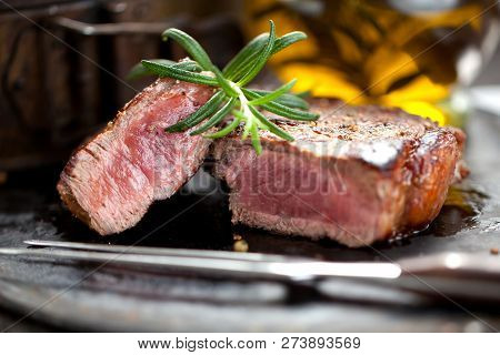 Fresh Juicy Medium Rare Beef Grillsteak. Barbecue Meat Close Up.
