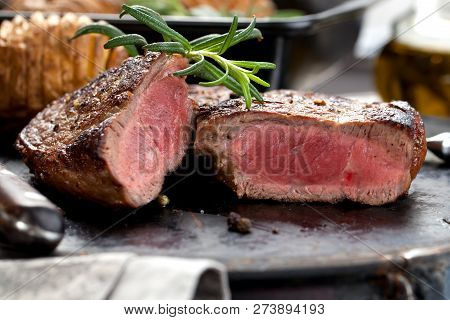 Fresh Juicy Medium Rare Beef Grillsteak. Barbecue Meat Close Up.