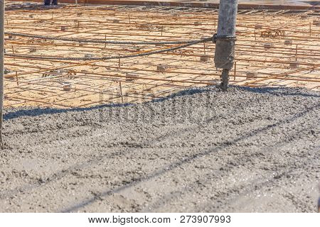 Pouring Ready-mixed Concrete From Mixing Mobile The Concrete Mixer From Concrete Pump And Placing Bo