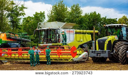 Vinnitsa, Ukraine - July 2017: Grain Harvesting Equipment In The Field. Agricultural Sector