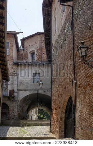 Saluzzo, Cuneo, Piedmont, Italy: Historic Buildings Along An Old Typical Street