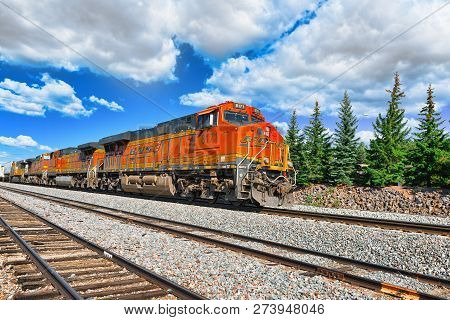 Freight Train Bnsf Railway Companies On A Sunny Day In Arizona.