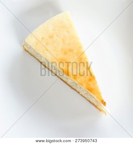 milk cake sweet food / piece of dessert delicious top view milk cake vanilla slice on white plate on the table