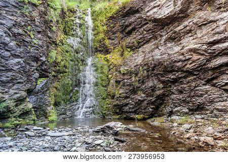 Little Waterfall In Green Summer Mountains, Norway.