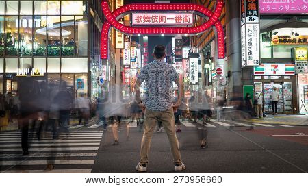 Tokyo, Japan - August 2018: Long Exposure Photo Of An Unidentified Man Standing At Kabukicho In The 