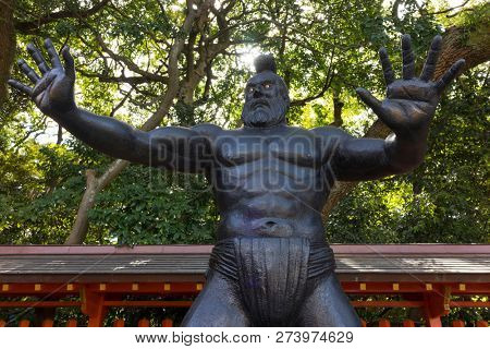 Fukuoka, Japan - October 20, 2018: Statue of a sumo wrestler of ancient times at the Sumiyoshi shrine grounds