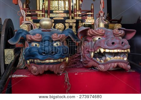 Fukuoka, Japan-October 19, 2018: Terrifying dog heads as guards on display in the Kushida ninja shrine grounds