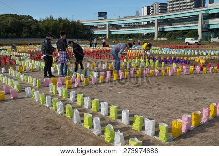 Fukuoka, Japan - October 20, 2018: Preparing colorful paper lanterns for the Hakata Tomyo Watching festival at  Shofukuji temple grounds