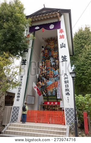 Fukuoka, Japan-October 19, 2018: A huge festival float, called kazariyam, is on permanent display in the Kushida ninja shrine grounds 