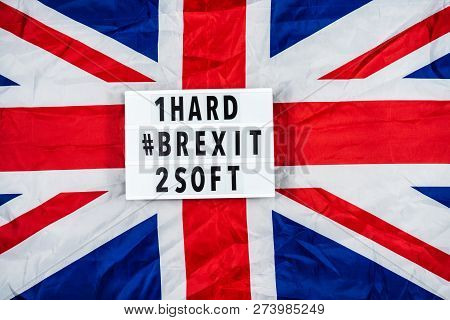 Brexit Concept Union Jack And Eu Flag Separated.piggy Coin Bank On Side,1p And 2p Coins.