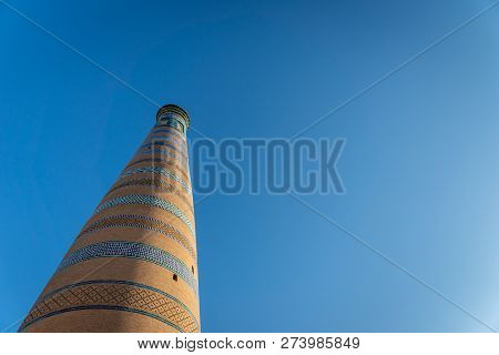 Khiva, Uzbekistan - September 2018: Minaret In The Old Town. Historic Old Town Of Khiva Is A Unesco 