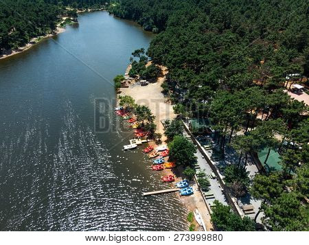 Aerial Drone View Of Aydos Forest Lake With Summer Pedalo Boats In Istanbul. Natural Life