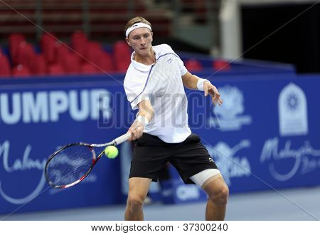 KUALA LUMPUR - SEP 27: Denis Istomin (Uzb) gioca la partita 2 presso l'ATP Tour Malaysian Open 20