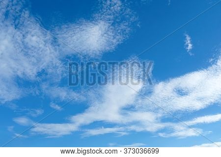 Blue Sky Background With Some Clouds Showing High Altitude Cirrus, Cirrostratus And Some Cirrocumulu