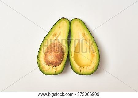 Sliced Avocado On A White Background.