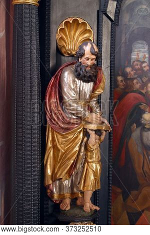 ZAGREB, CROATIA - MAY 16, 2013: Saint Matthew the Evangelist, statue on the altar of the Holy Spirit in the Church of Saint Catherine of Alexandria in Zagreb, Croatia