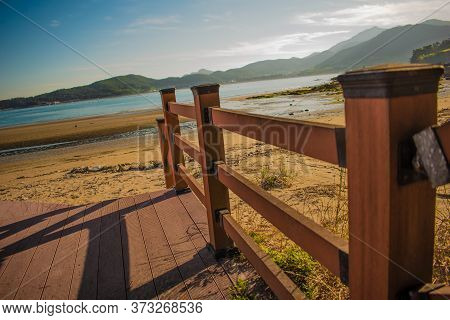 Fence With Sea In The Evening Click By Me