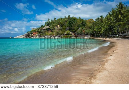Tropical island paradise turquoise clear water at Sairee beach on Koh Tao, Thailand