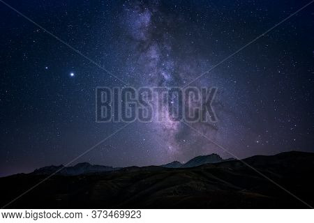Milky Way Passing Over The The 2389 Metre High Peak Of Monte Padru In The Asco Range Of Corsica