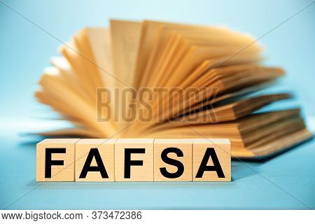 Wooden Cubes With The Abbreviation Free Application For Federal Student Aid Fafsa On The Background 