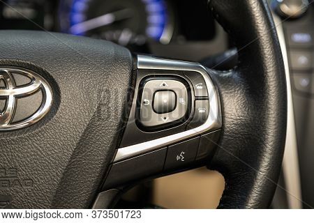 Novosibirsk/ Russia - June  15 2020: Toyota Camry , Car Steering Wheel With Control Buttons, Music V