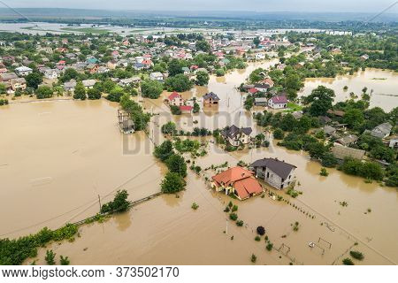 Aerial View Of Flooded Houses With Dirty Water Of Dnister River In Halych Town, Western Ukraine.