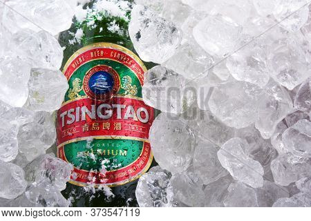 Two Bottles Of Tsingtao Beer In Crushed Ice