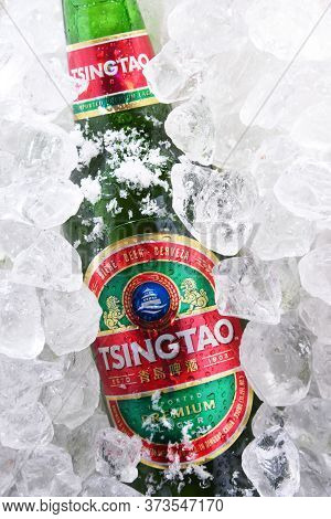 Two Bottles Of Tsingtao Beer In Crushed Ice