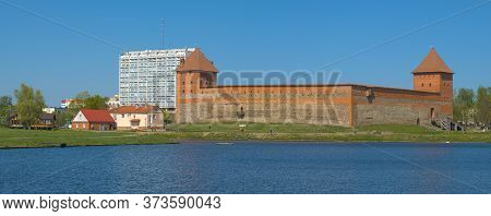 View Of The Medieval Castle Of Prince Gedemin In A Sunny April Day. Lida, Belarus