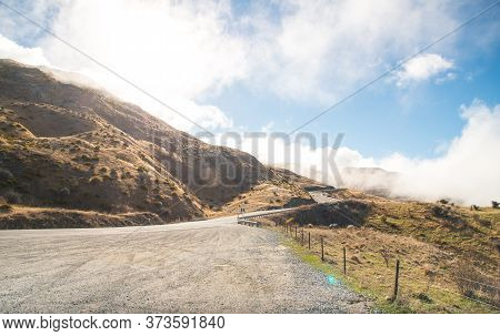 View Of Highway Road On The Famous Crown Range Road, The Highest Paved Highway In Cardrona Valley, O