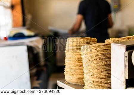 Tortillas Stacked On A Tortilla Machine
