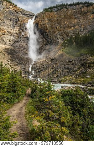 The Rocky Mountains. Majestic Takakkaw Falls Waterfall On Rock Face And Takakkaw Stream   In Yoho Na