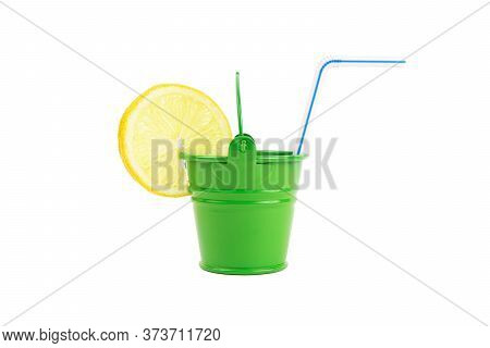 Closeup Of A Green Water Bucket With A Lemon Slice And A Drinking Straw Isolated On White. Thirst-qu