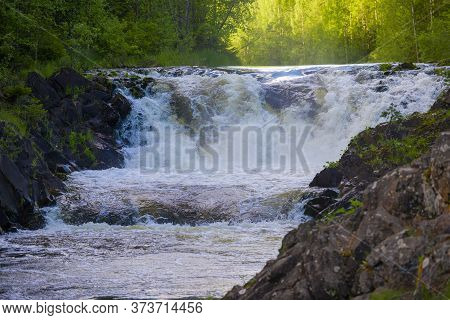 The Upper Threshold Of The Kivach Waterfall Close Up On A June Sunny Evening. Karelia, Russia