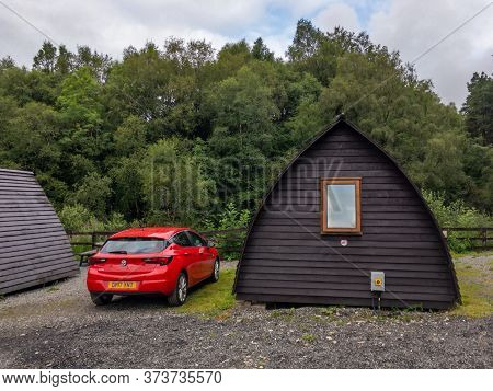 Tyndrum, Scotland - August 2, 2020: Red Vauxhall Opel Astra Car. Travelling Around Scotland In A Bra