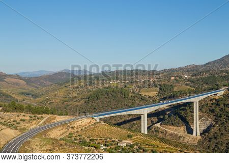 Scenic view of the Douro Valley and river with terraced vineyards near the village of Tua, Portugal