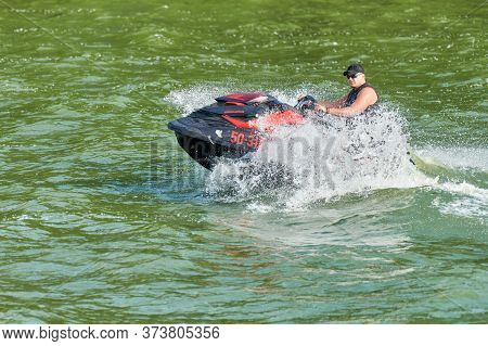 Voronezh, Russia - 23.08.2019 - Man On Water Scooter. Summer Vacation On Personal Watercraft In Trop