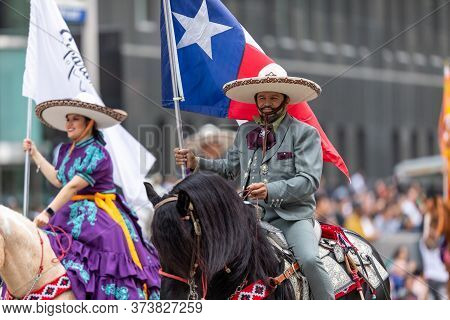 Houston, Texas, Usa - November 28, 2019: H-e-b Thanksgiving Day Parade, A Group Of Charro Horse Ride